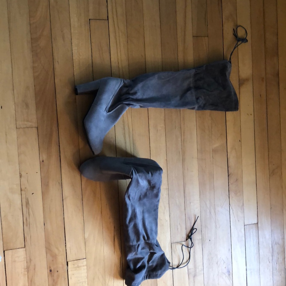 Thigh high heeled boots